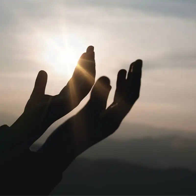 hands facing up while praying